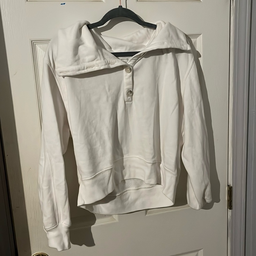 Quarter button cropped sweater.